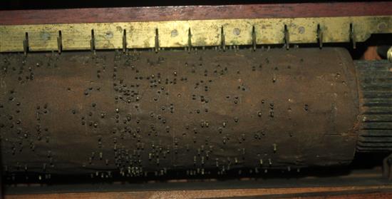 An early 19th century mahogany barrel organ, 12.5in.